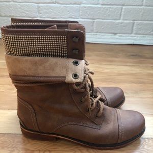Brown combat boots with gold detail